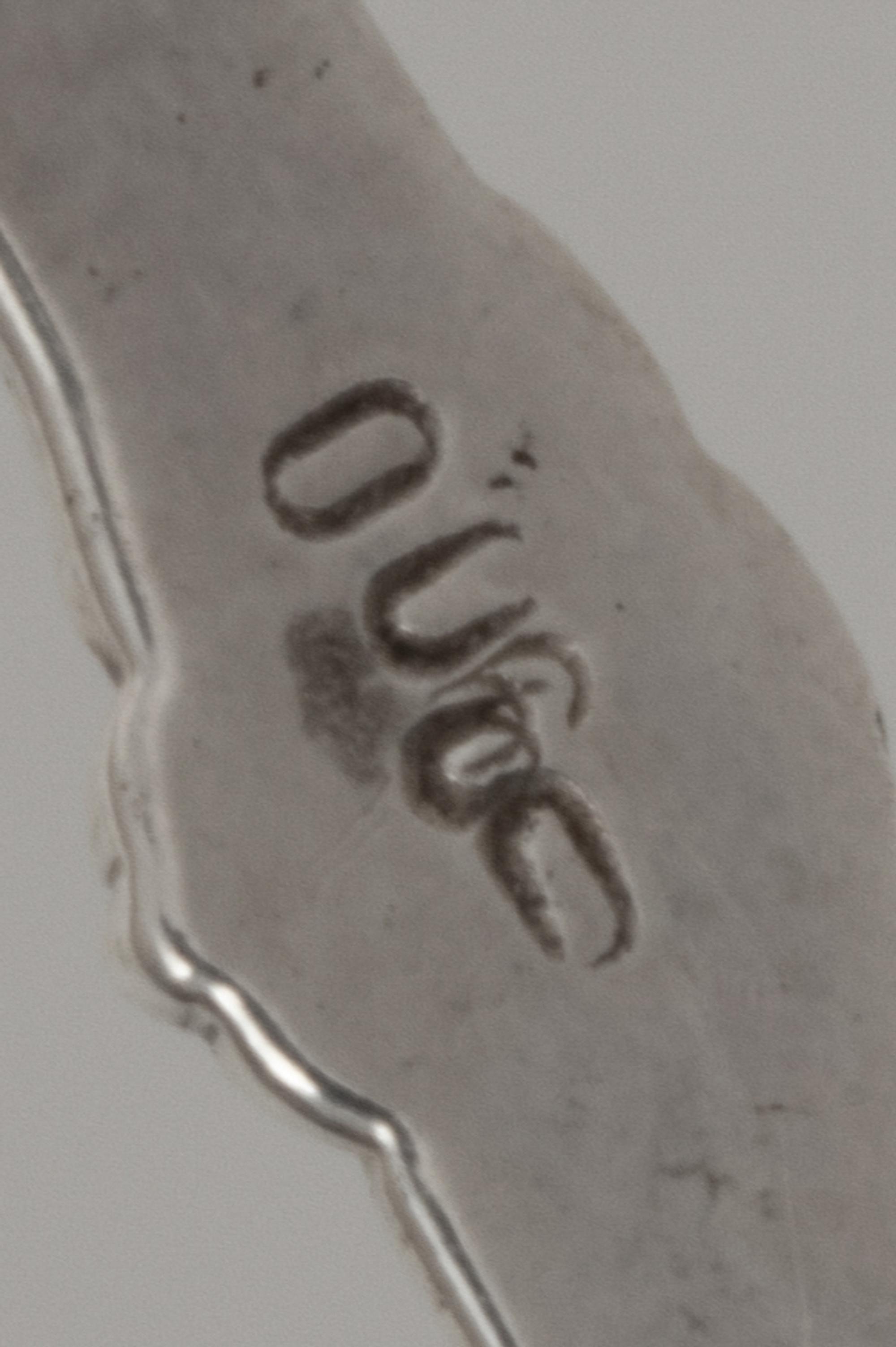 A Set of Six Silver Bowls with Handles