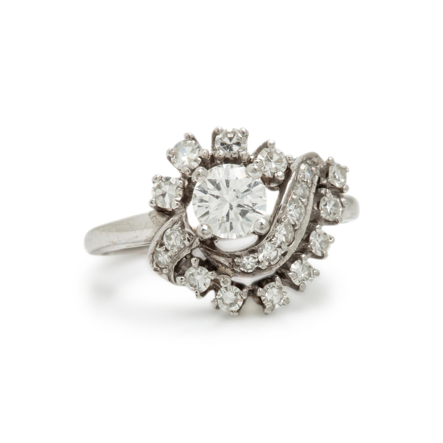 Diamond and White Gold Swirl Ring