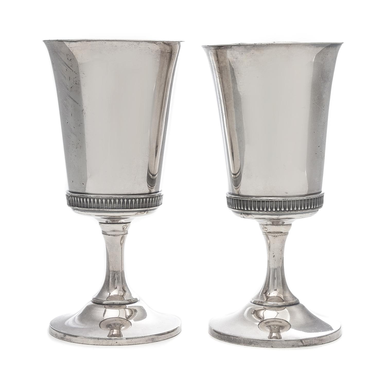 A Pair of Silvered Metal Goblets Height 7 3/8 inches.
