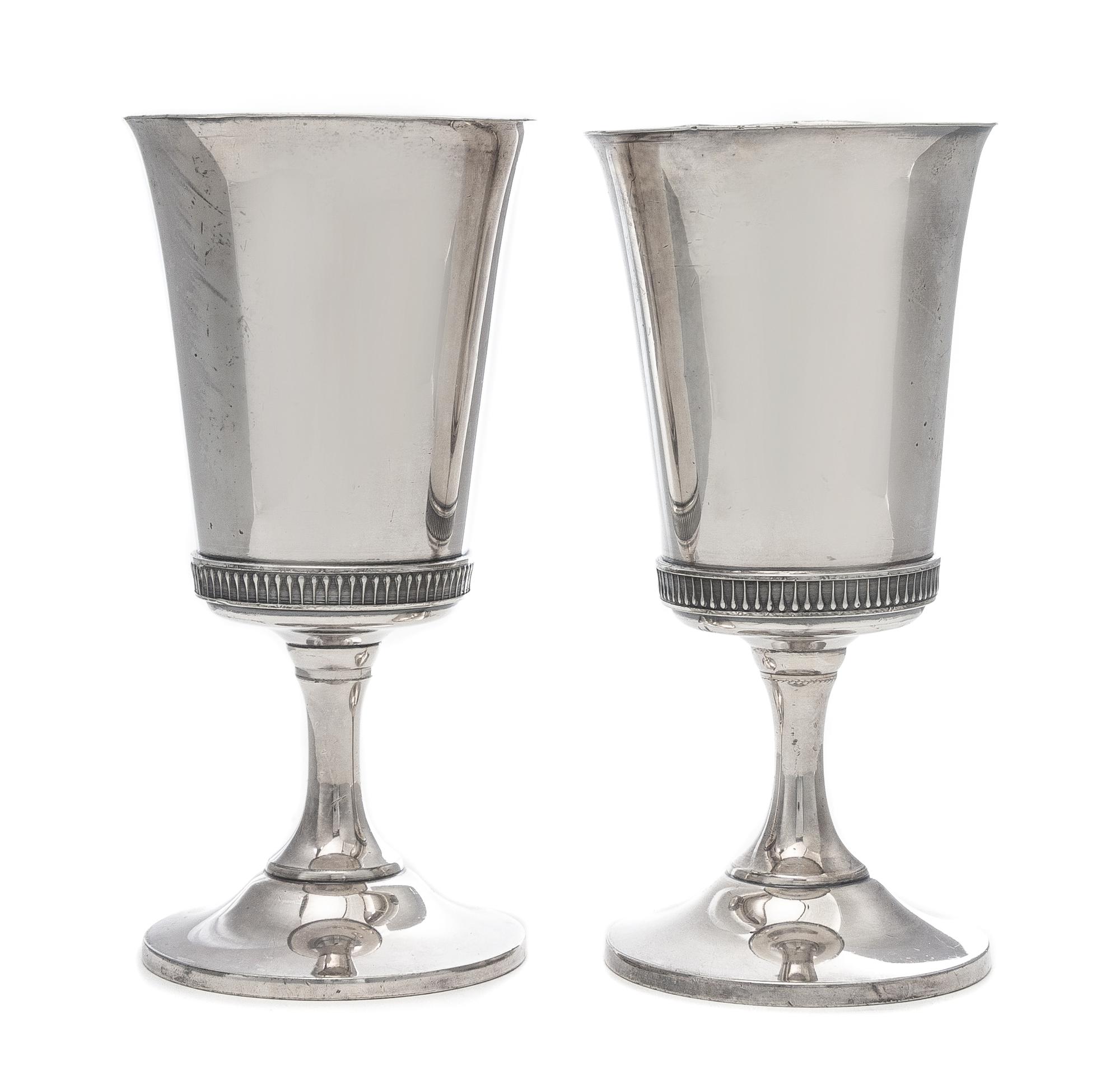 A Pair of Silvered Metal Goblets Height 7 3/8 inches.