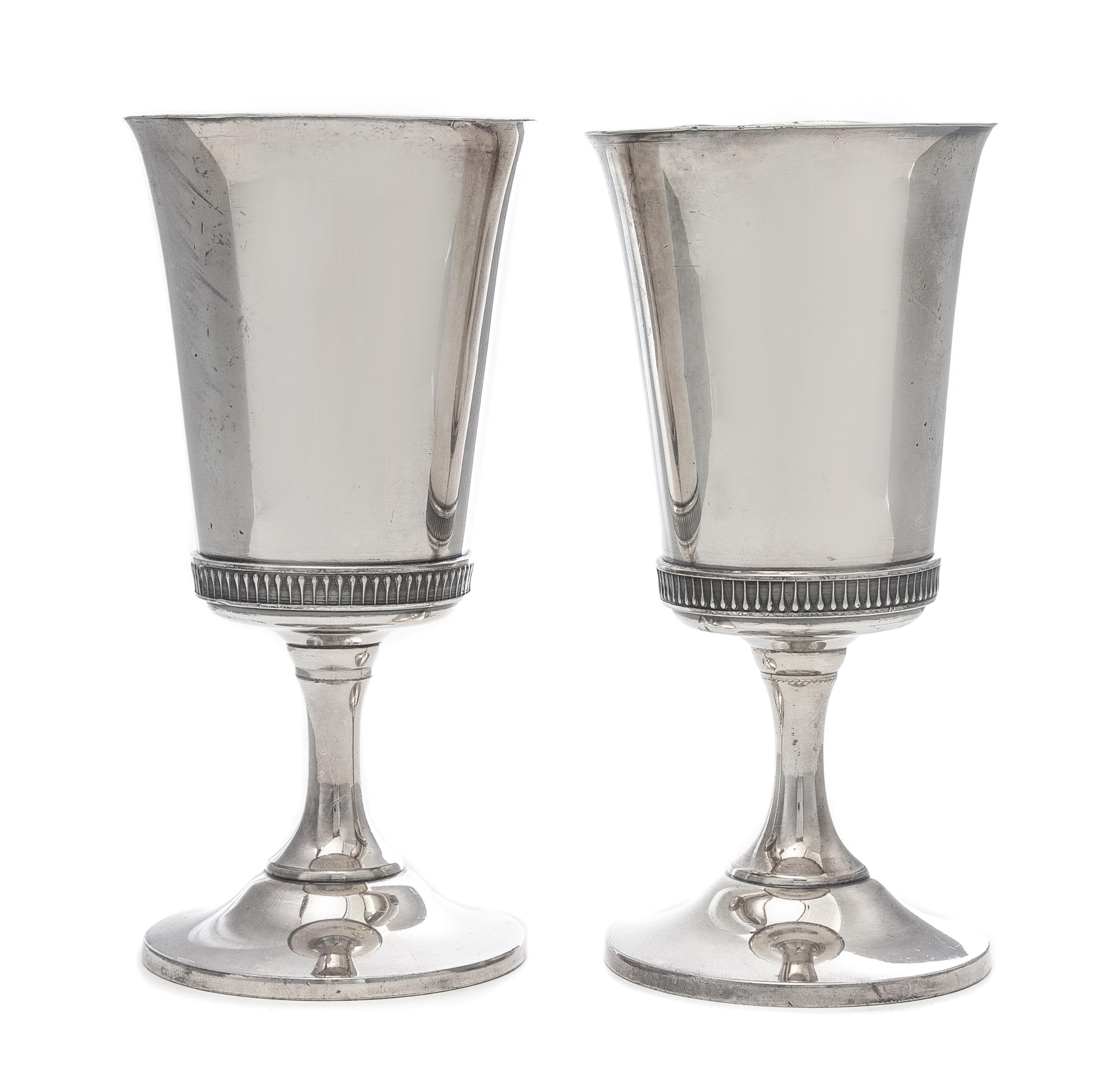A Pair of Silvered Metal Goblets Height 7 3/8 inches.