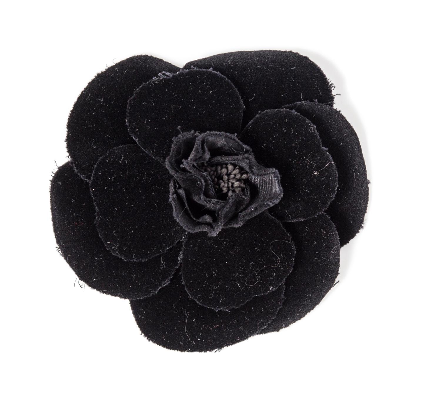 A Chanel Black Velvet Camelia Brooch, 4.5" x 4.5".