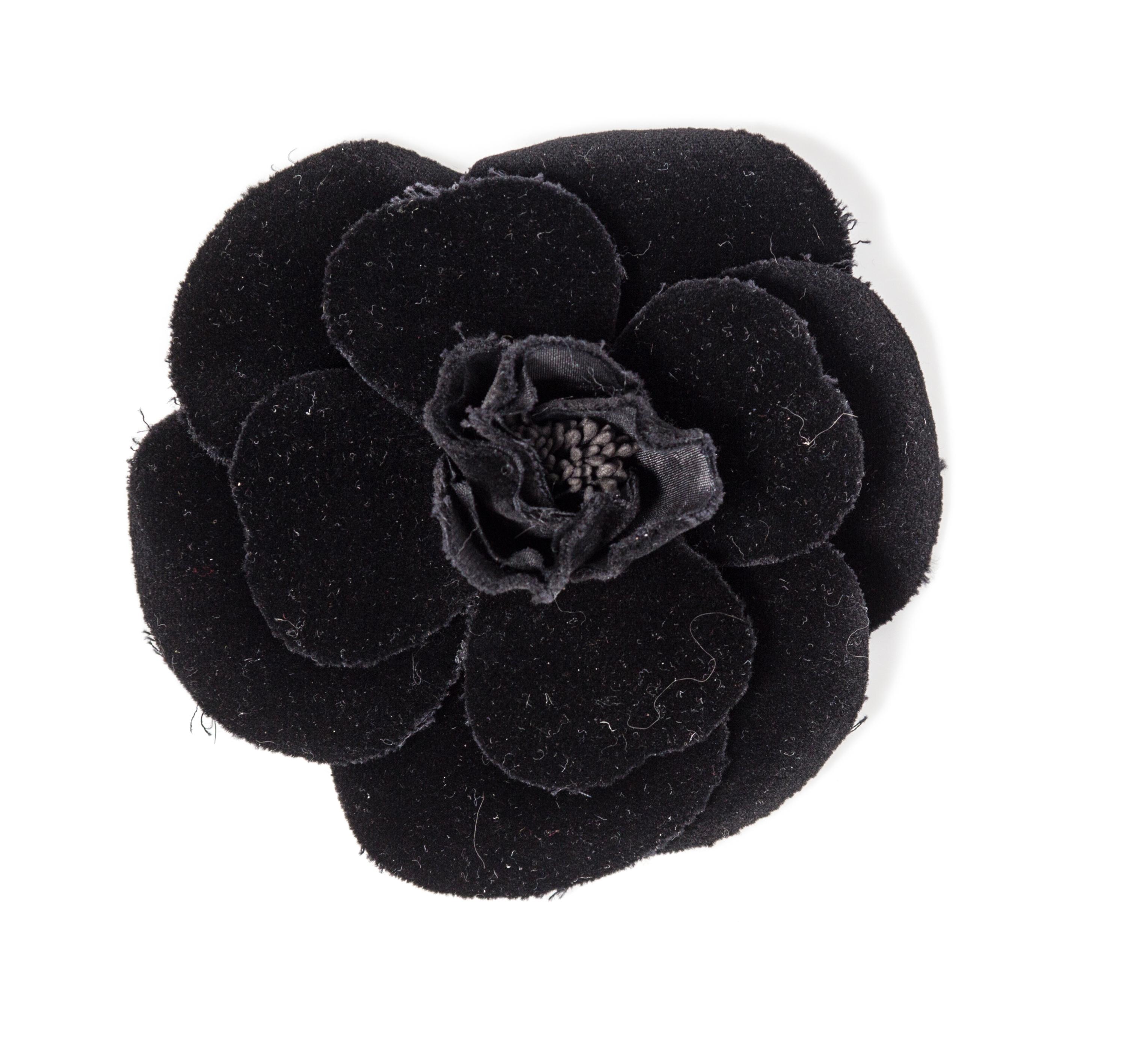 A Chanel Black Velvet Camelia Brooch, 4.5" x 4.5".