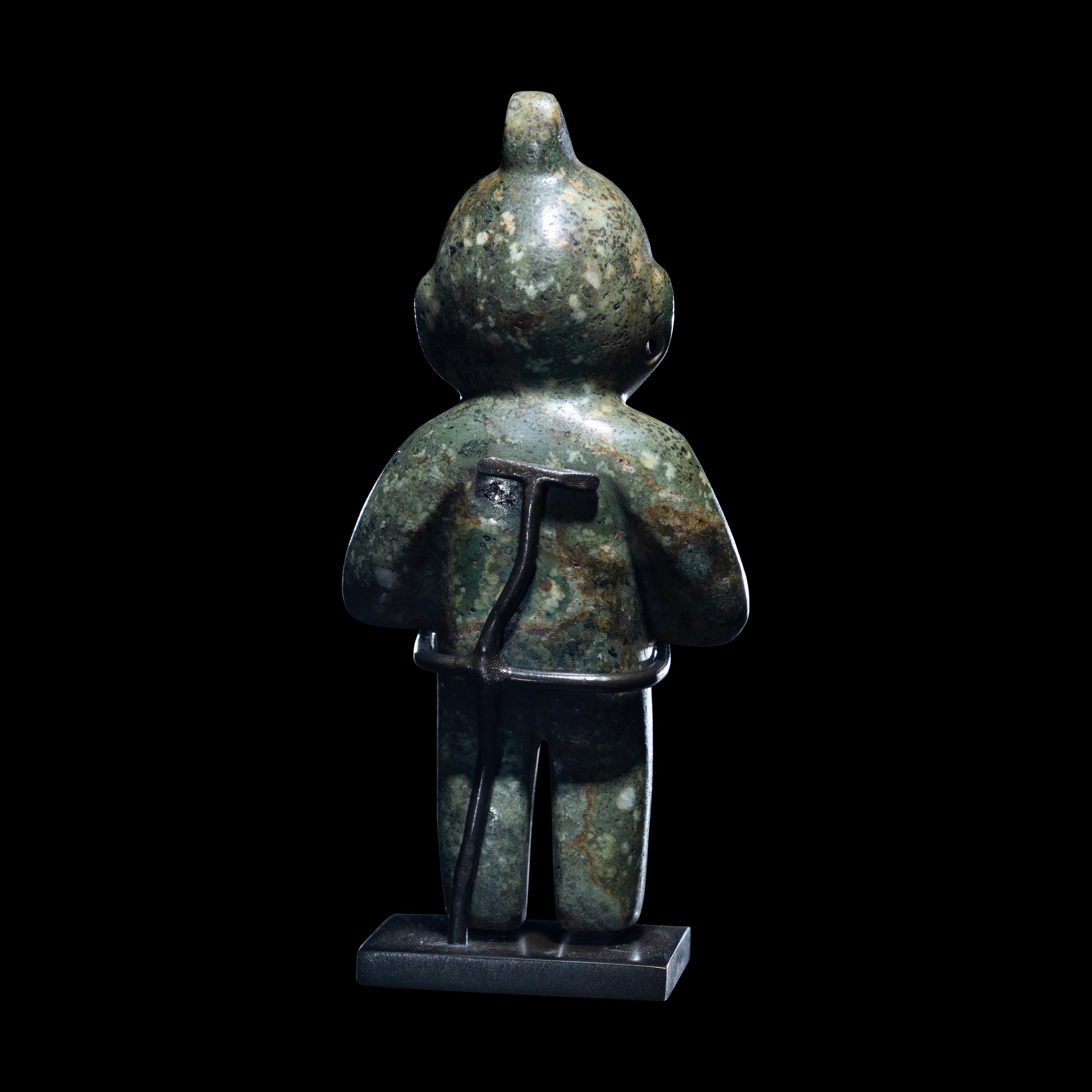 An Olmec Jade Transformation Figure