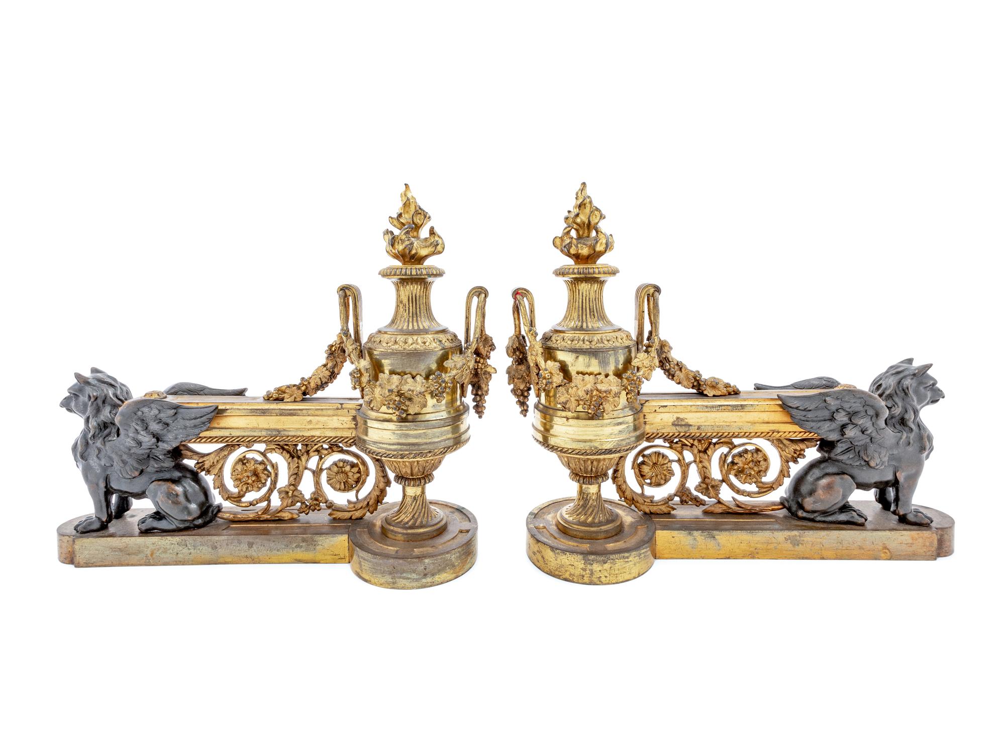 A Pair of Empire Style Gilt and Patinated Bronze Chenets