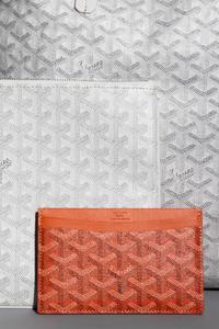 Six Goyard Items: Two Totes, Three Pouches, and One Wallet