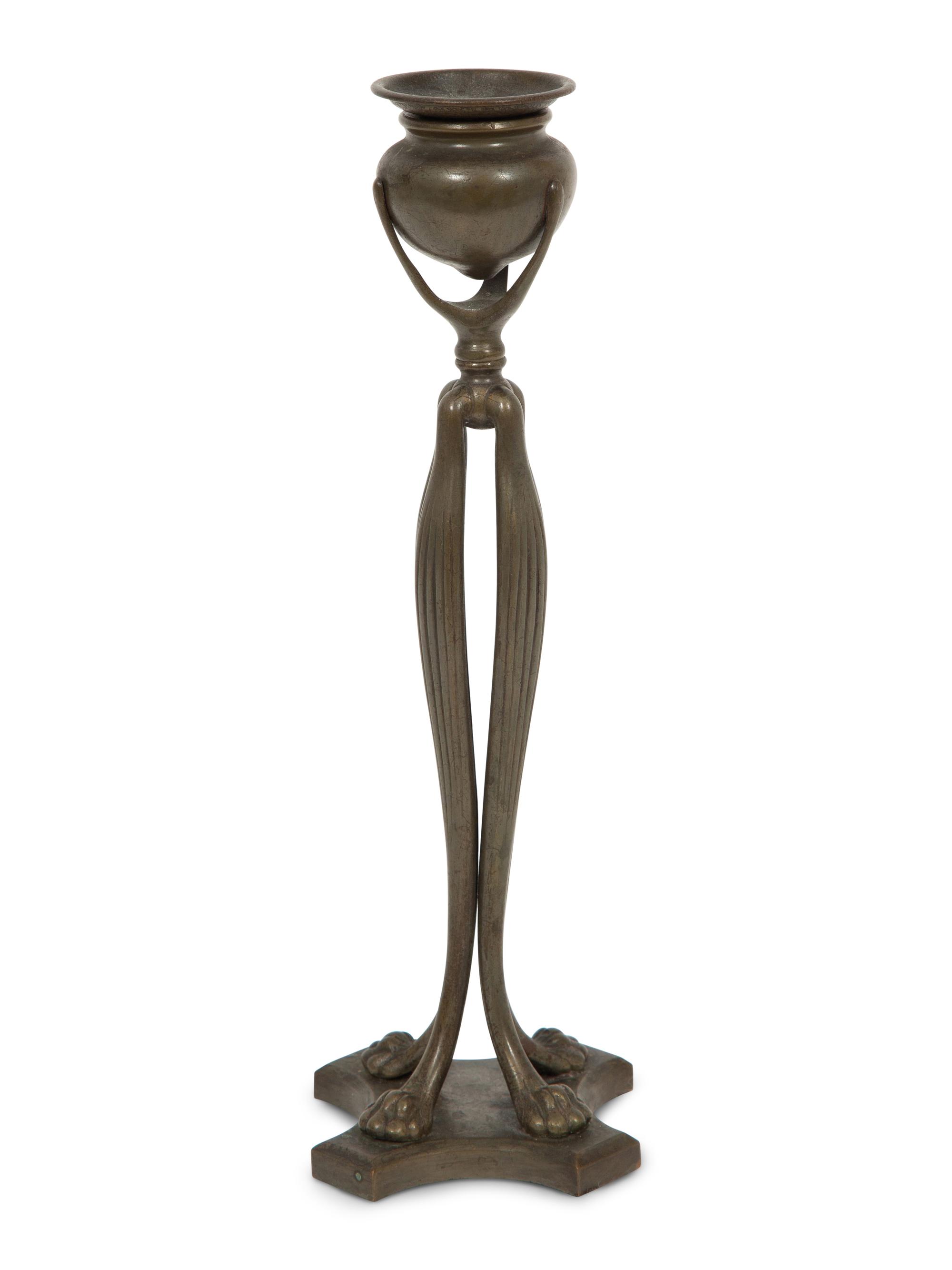 A Tiffany Studios Cat's Paw Bronze Candlestick