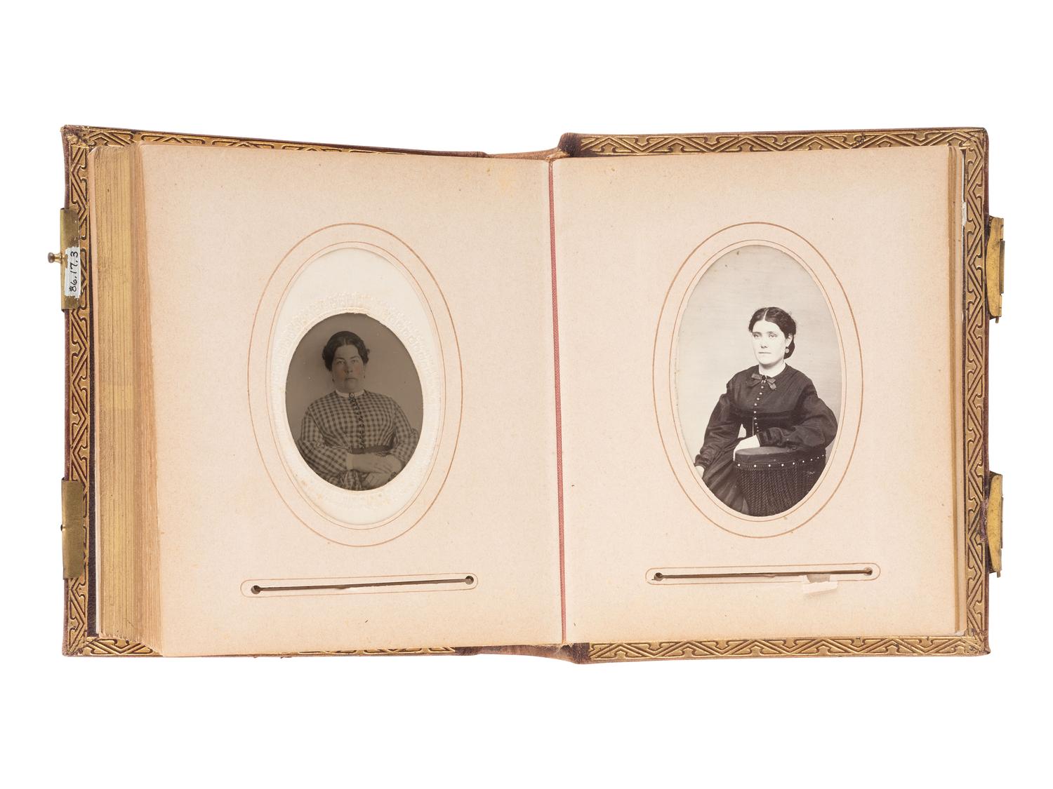 [EARLY PHOTOGRAPHY]. Four albums containing CDVs, tintypes, and cabinet cards of varying subjects.