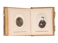 [EARLY PHOTOGRAPHY]. Four albums containing CDVs, tintypes, and cabinet cards of varying subjects.