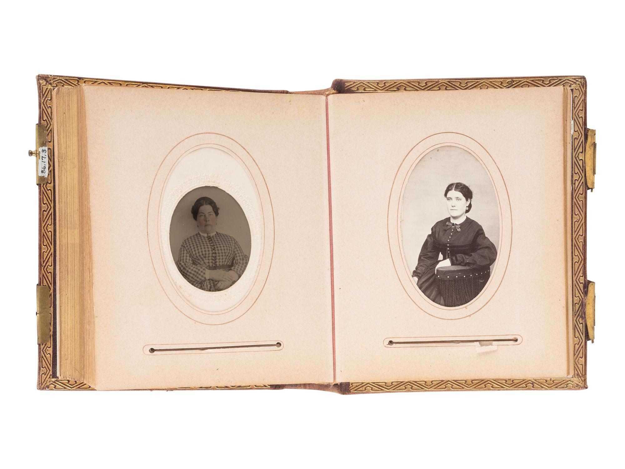 [EARLY PHOTOGRAPHY]. Four albums containing CDVs, tintypes, and cabinet cards of varying subjects.