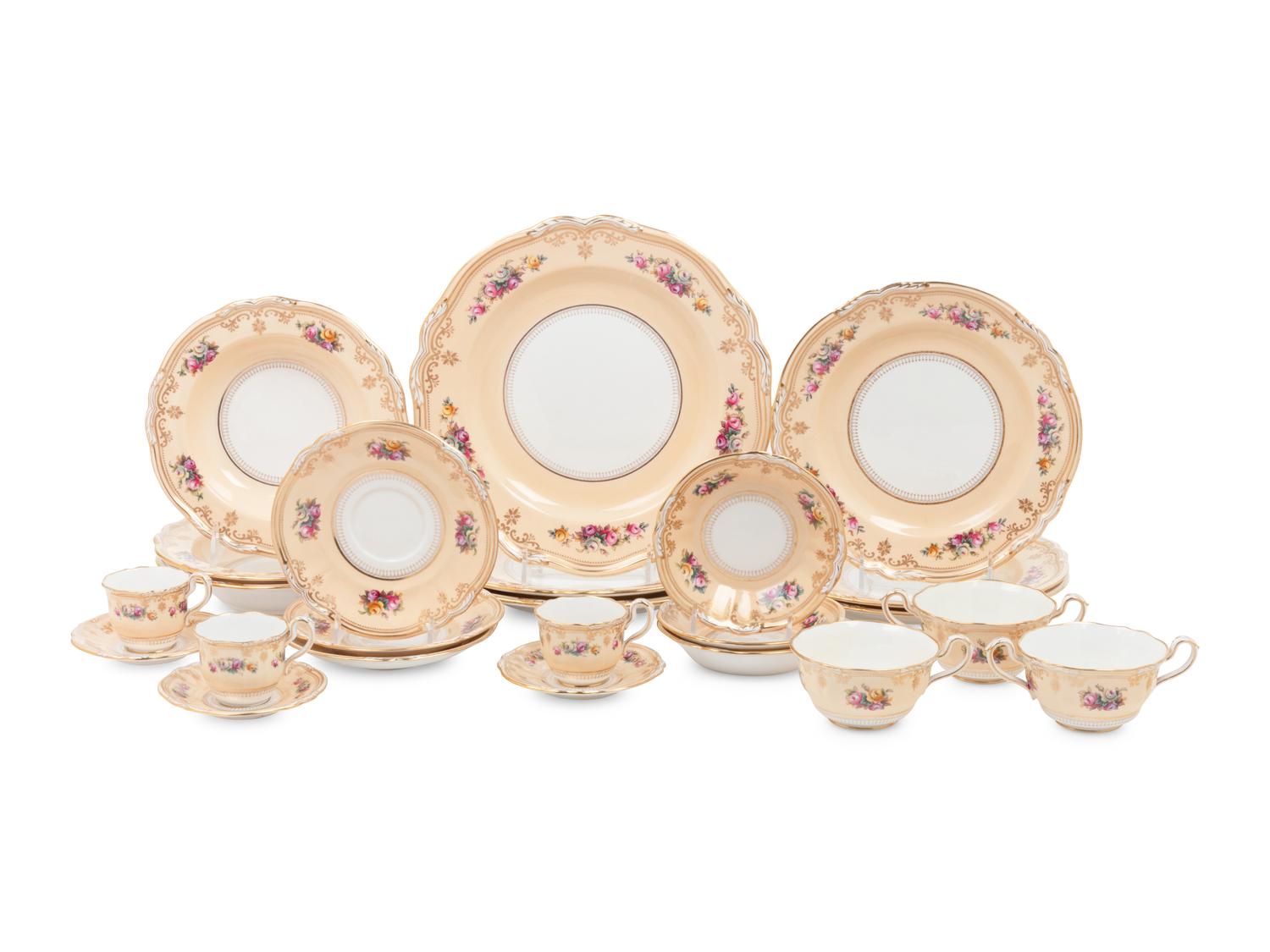 A Spode Parcel Gilt Porcelain Dinner Service