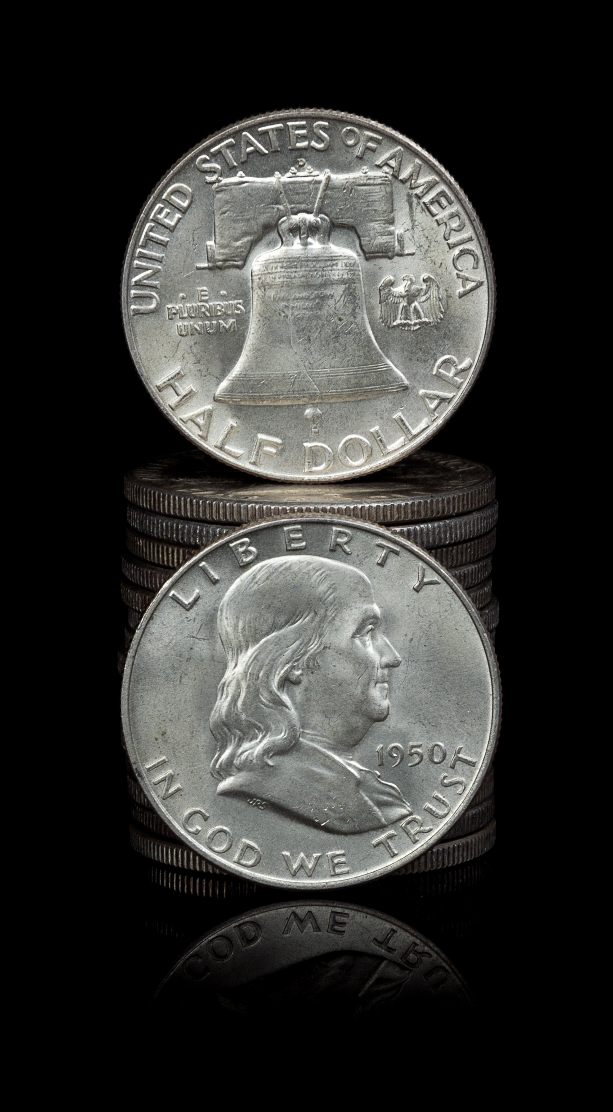 A Group of Twenty United States Benjamin Franklin 50c Coins