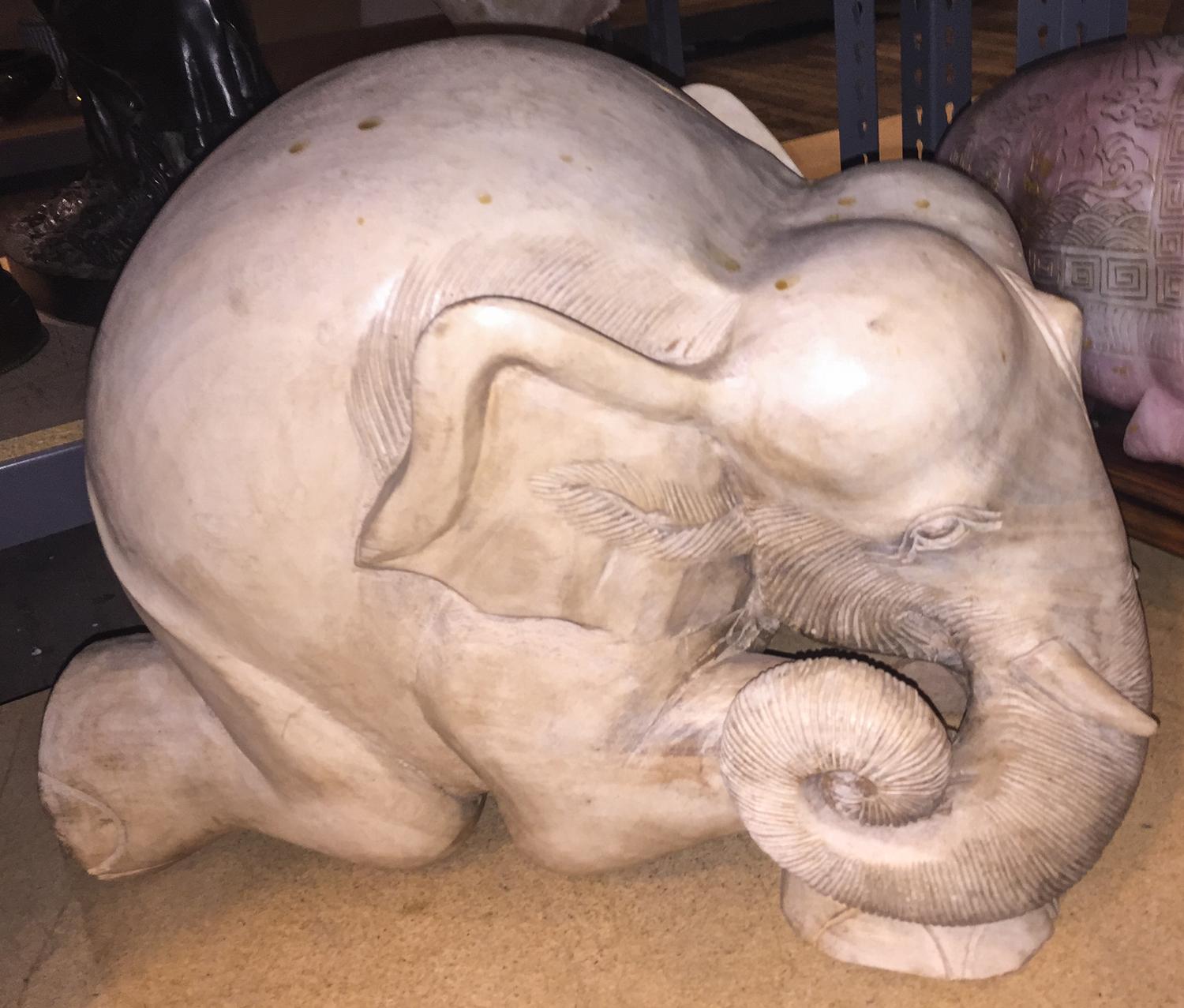 A Carved Wood Elephant Height 15 1/2 inches.