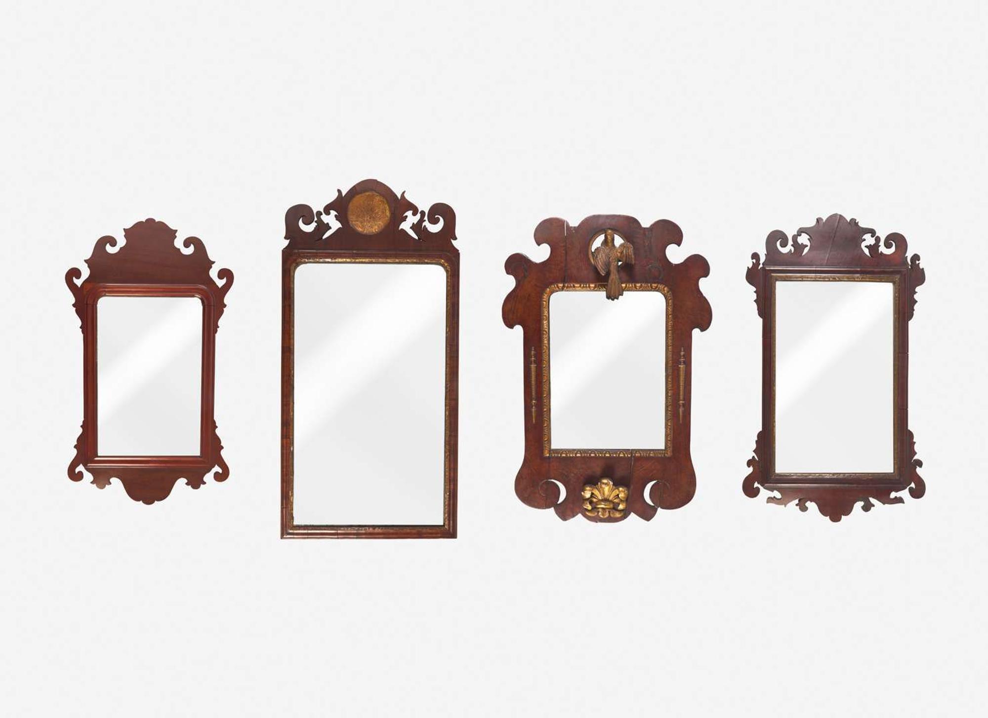 A group of four Queen Anne and Chippendale fret-carved mahogany and parcel-gilt looking glasses, 18th / 19th century