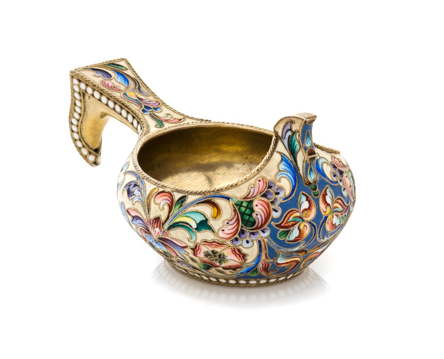 A Russian Enameled Silver Kovsh, Maker's mark obscured, Moscow, late 19th/early 20th century, the case having a beige ground with polyc