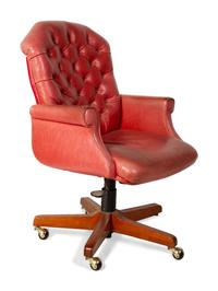 An English Tufted Red Leather Office Chair — 19TH CENTURY