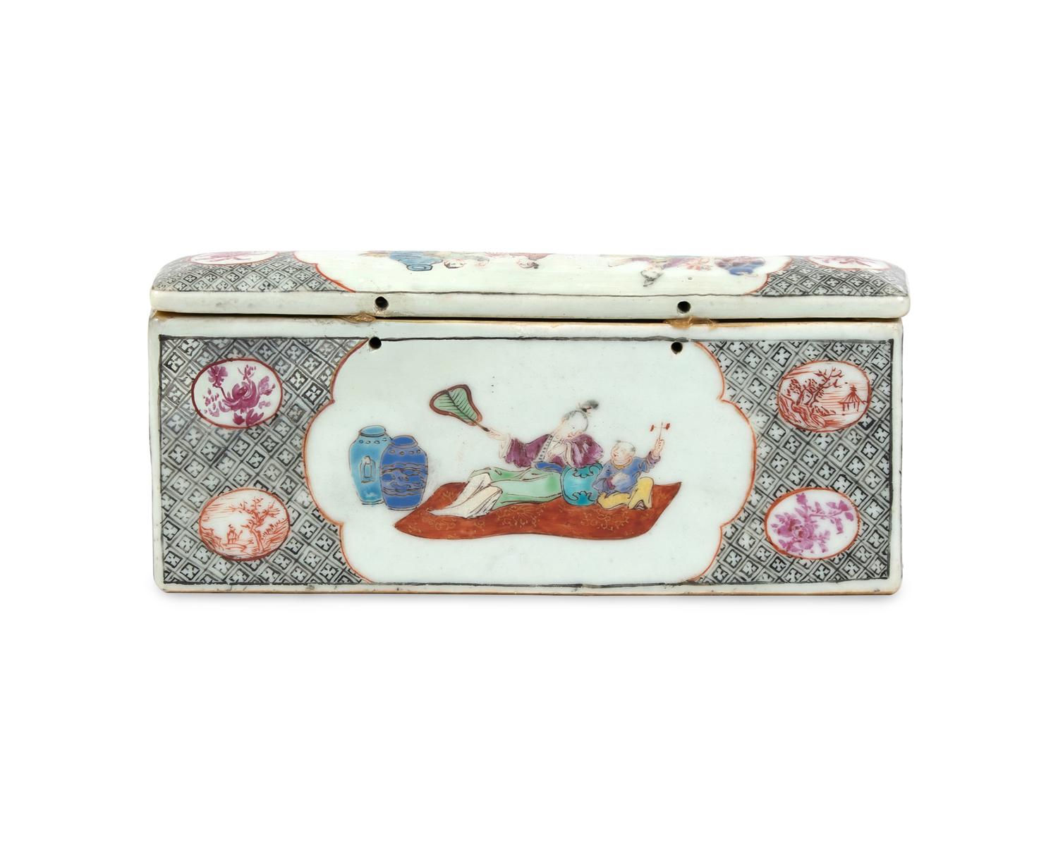 A Chinese Export Porcelain Famille Rose Inkstand And Pair Of Candlesticks