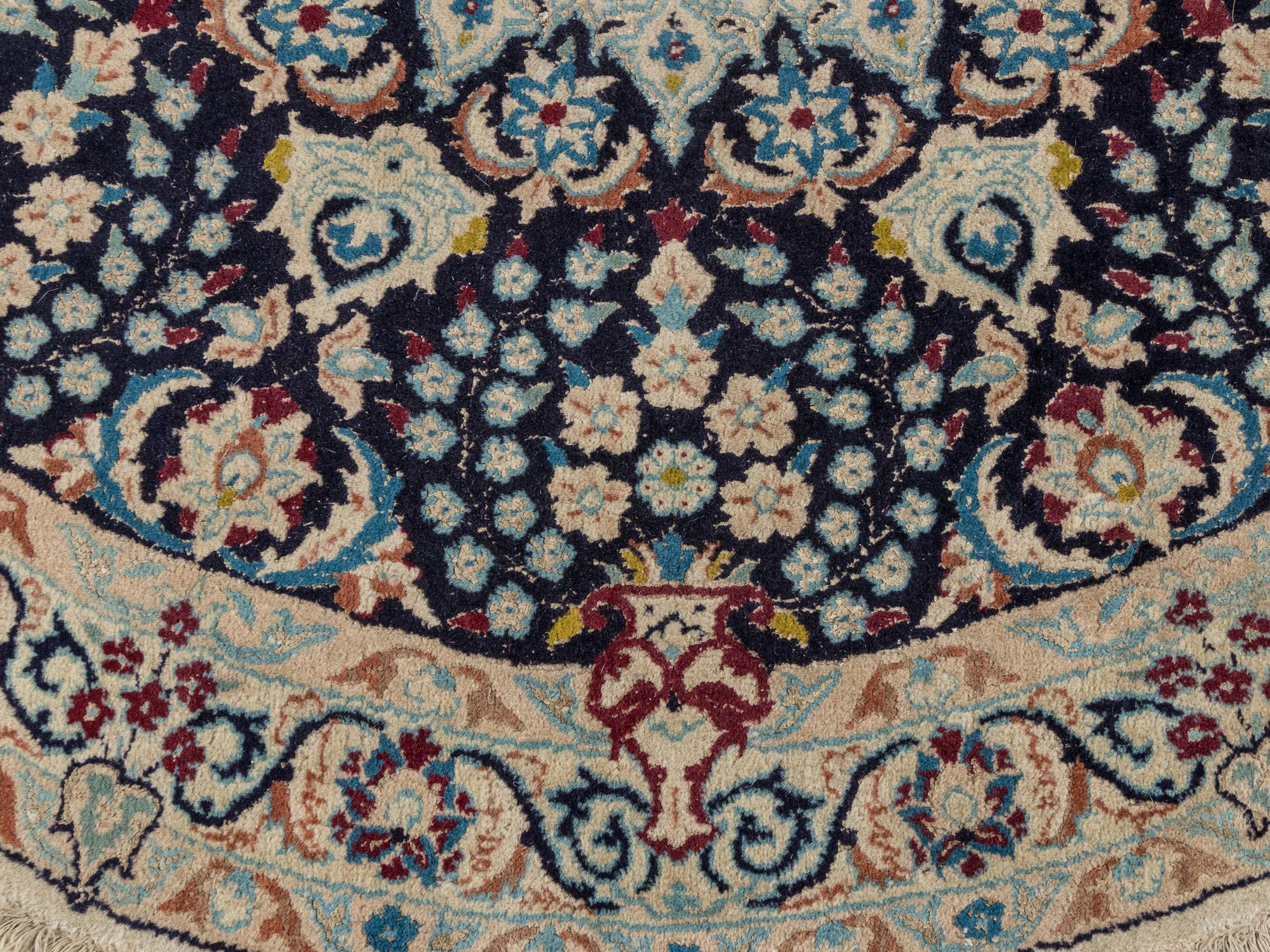 A Persian Nain Wool Circular Rug
