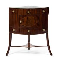 A George III Mahogany Corner Washstand, EARLY 19TH CENTURY, Height 49 x width 26 1/2 x depth 19 inches. — EARLY 19TH CENTURY,