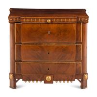 A Baltic Style Parcel Gilt Mahogany Chest of Drawers