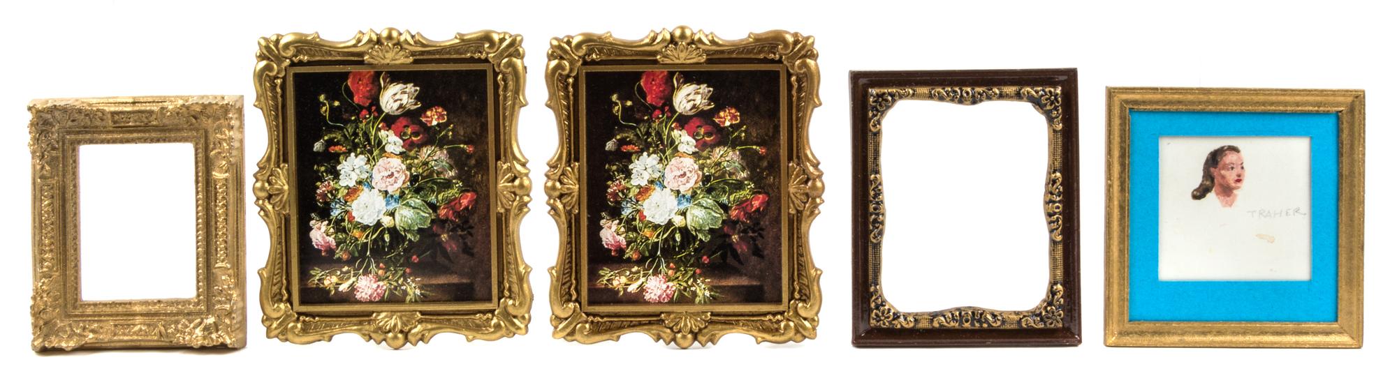 A Group of Four Frames Largest 3 3/8 x 2 7/8 inches.
