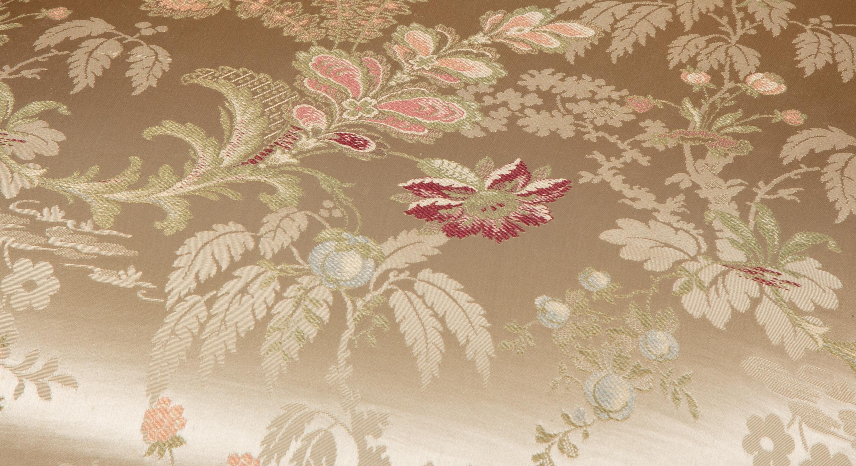 A Louis XV Style Painted Cane Back Tete-a-Tete