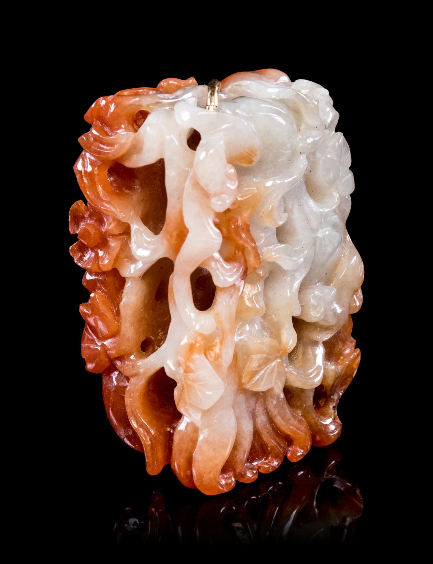A Russet Jadeite Reticulated Pendant