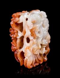 A Russet Jadeite Reticulated Pendant