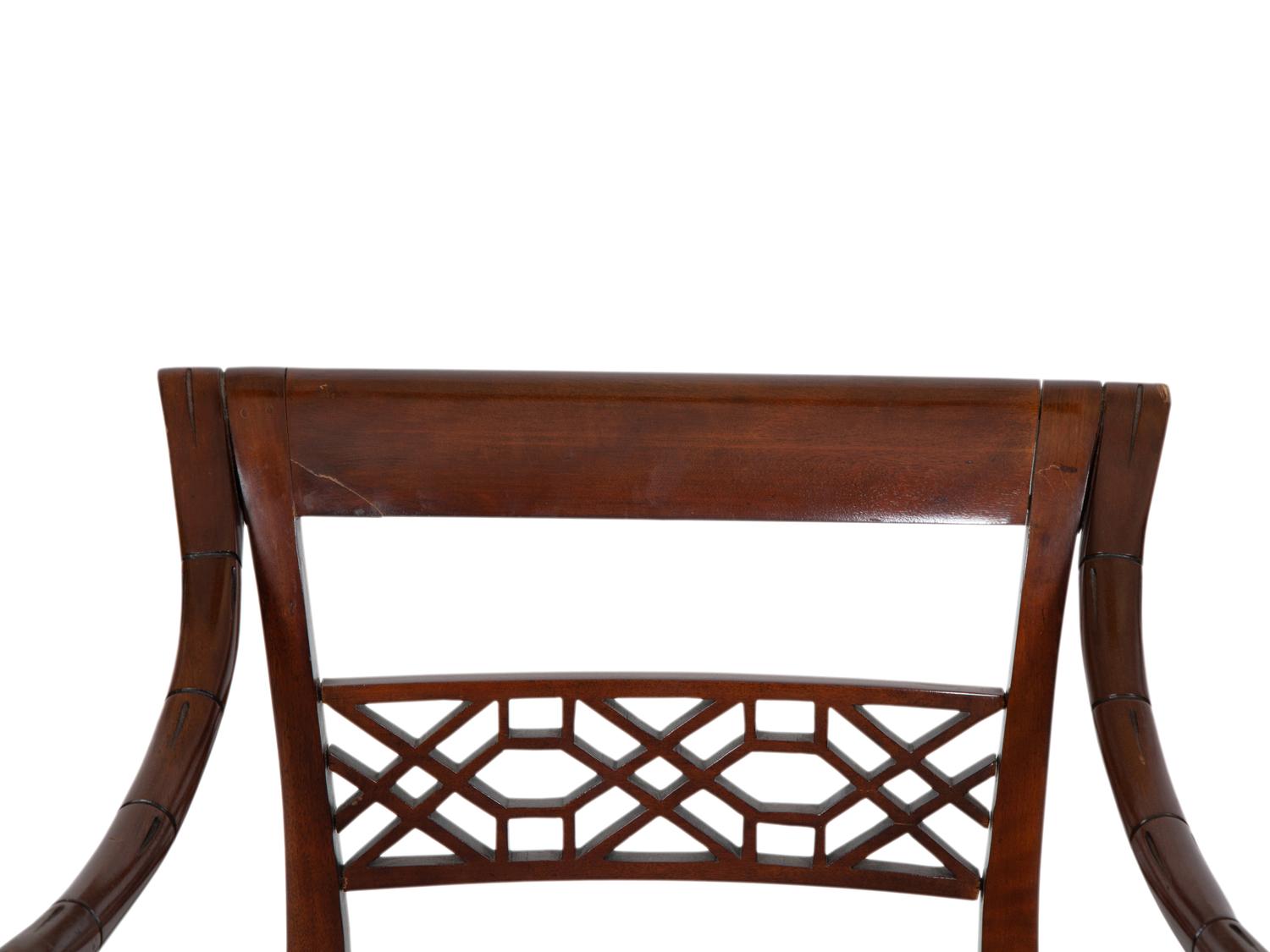 A Set of Four Regency Style Mahogany Cane Seat Dining Chairs