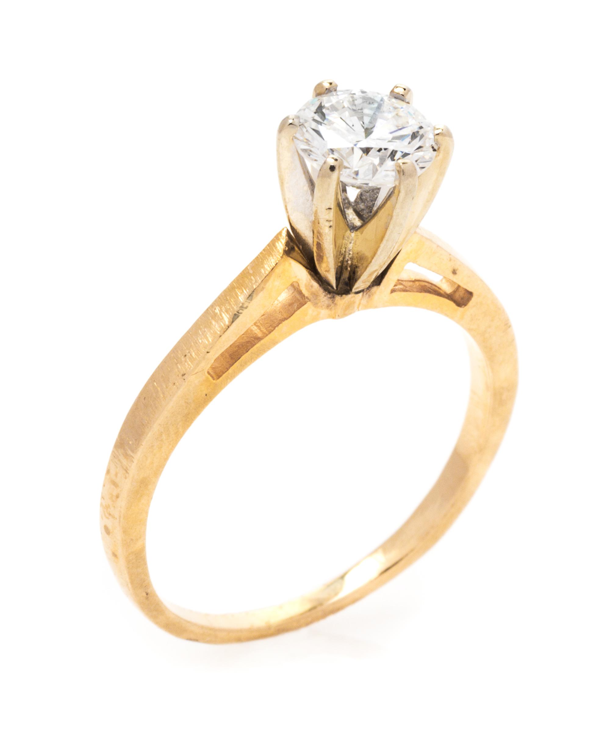 A Yellow Gold and Diamond Solitaire Ring, 1.50 dwts.