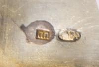 A Russian Silver Cigarette Case, Mark of Pytor Petrov, Moscow, early 20th century, the lid worked to show two warriors on horseback wit