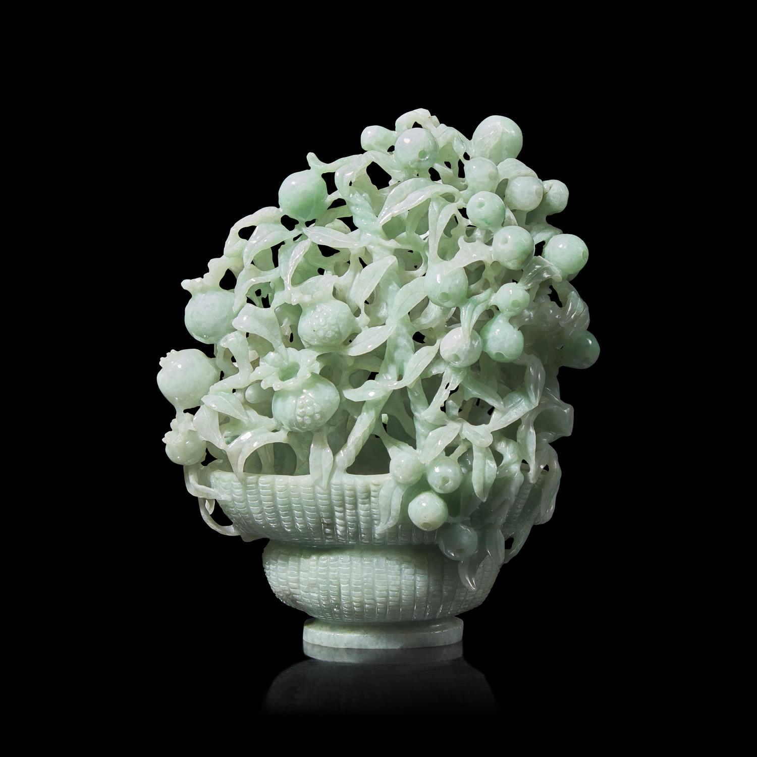 A Chinese Reticulated Jadeite "Sanduo" in Basket Group, 20th Century 近代 翡翠鏤雕三多擺件