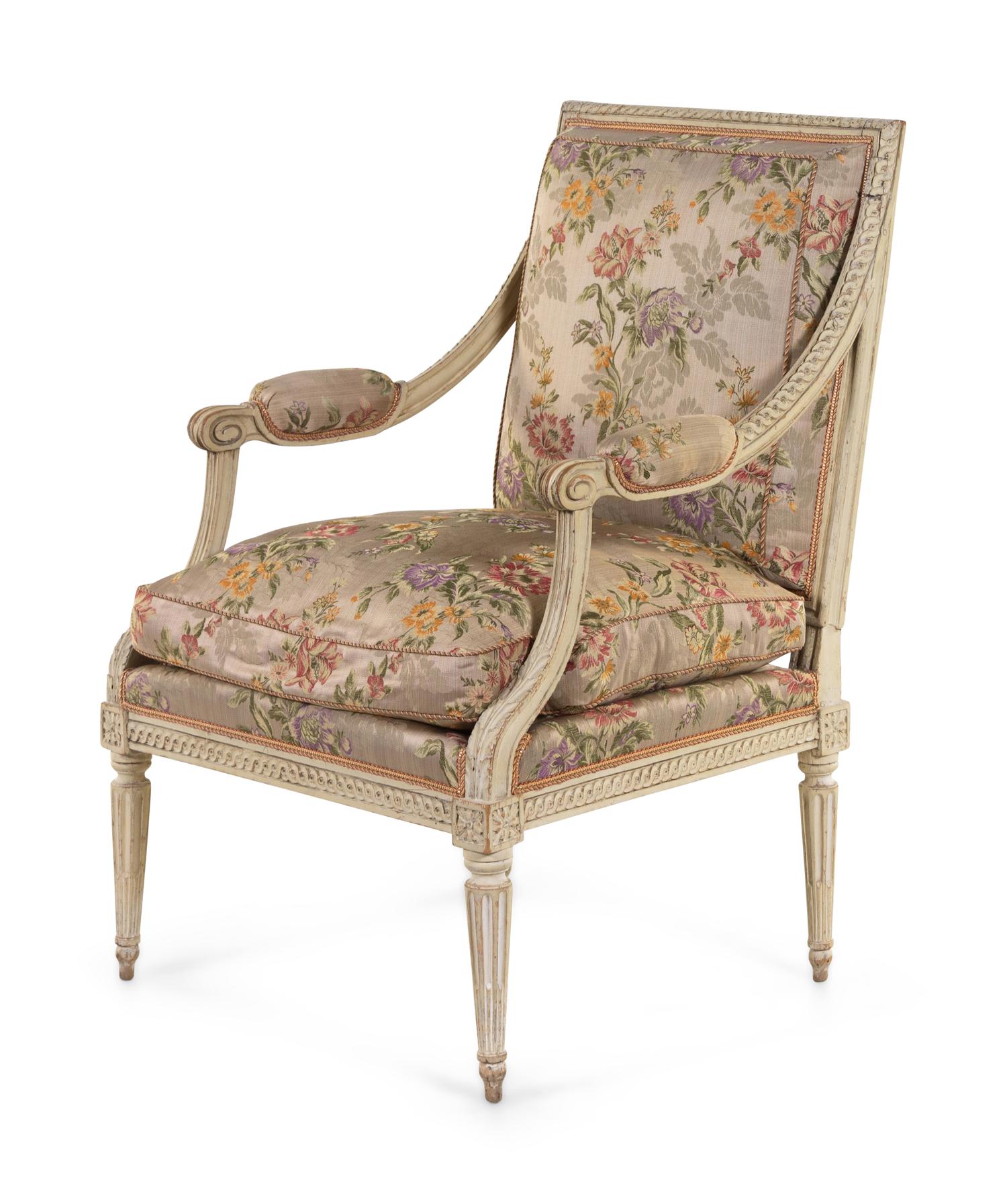 A Louis XVI Carved and White-Painted Fauteuil