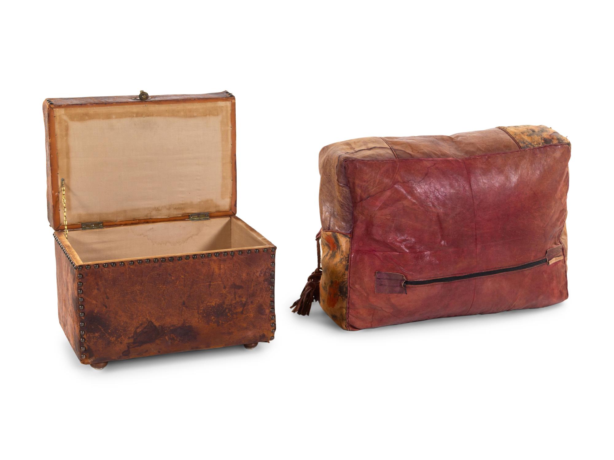 A Leather Upholstered Trunk and Pouf