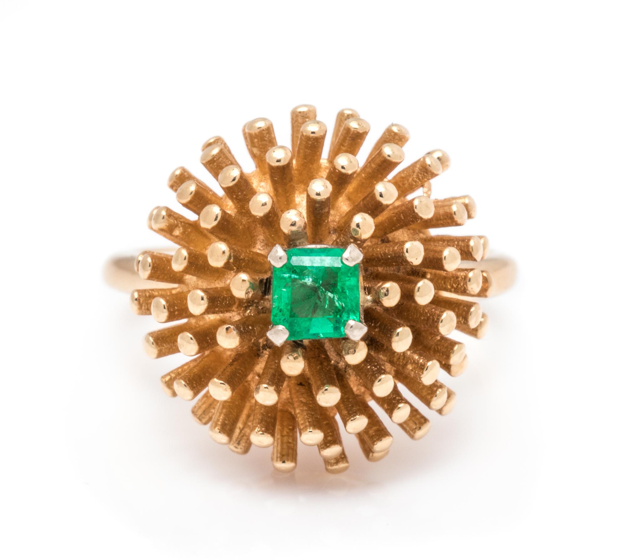 A 14 Karat Yellow Gold and Emerald Ring,