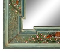 A Painted Molded Wood Framed Mirror with Reverse Painted Glass Panels Depicting Birds in Foliage