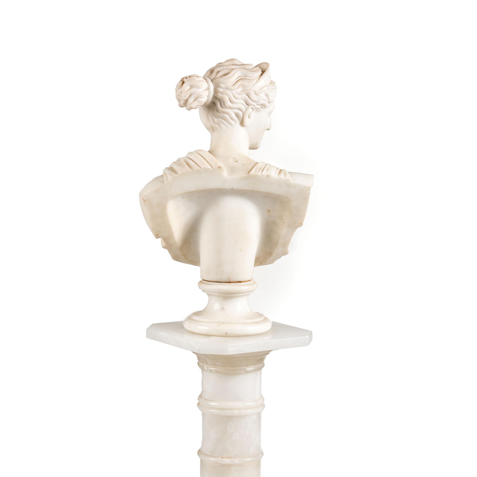 A Continental White Marble Bust of Diana the Huntress