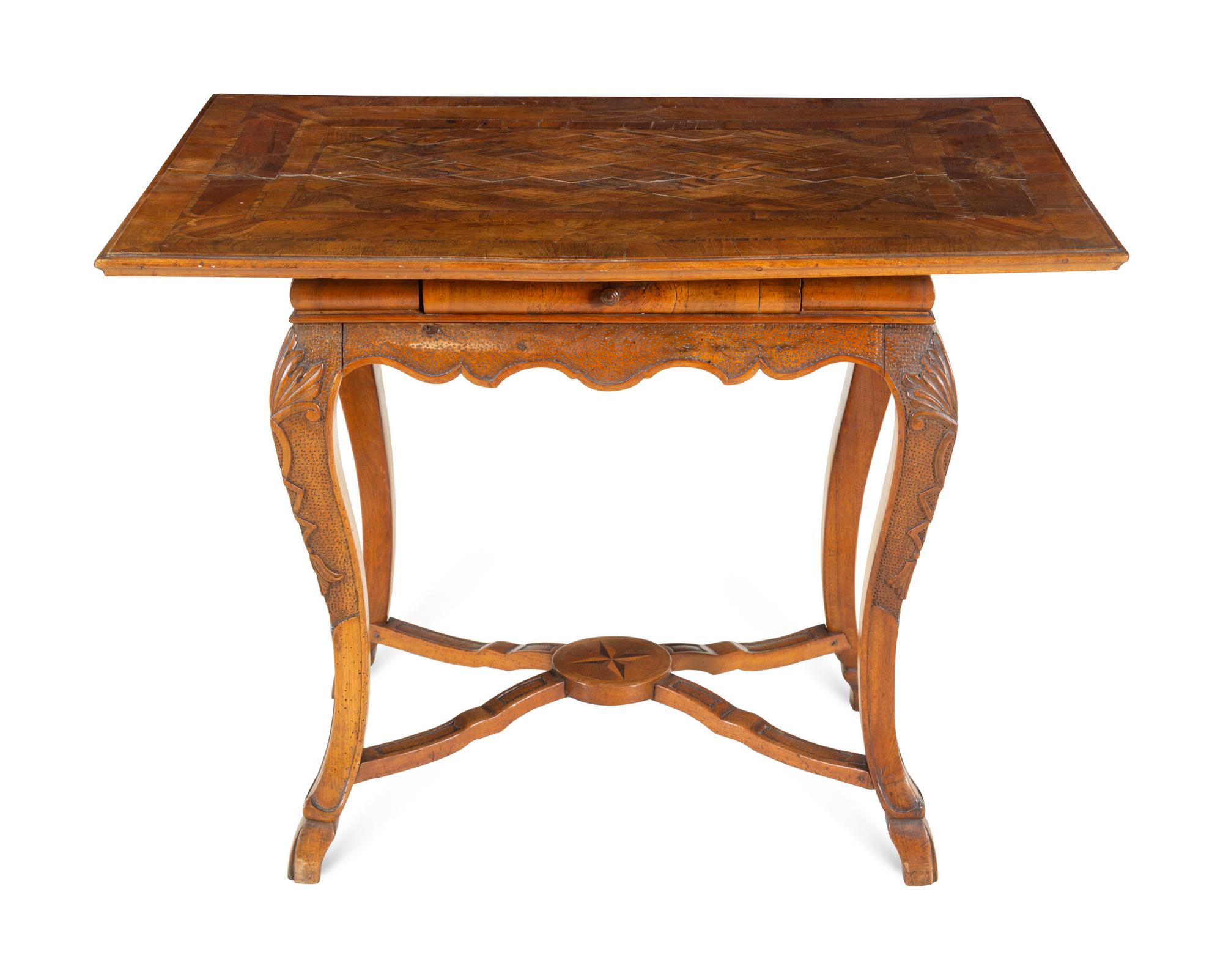 A Continental Carved Parquetry Center Table