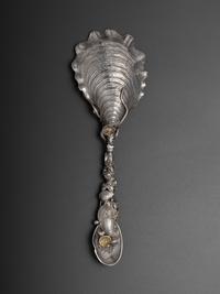An American Parcel Gilt Silver Serving Spoon