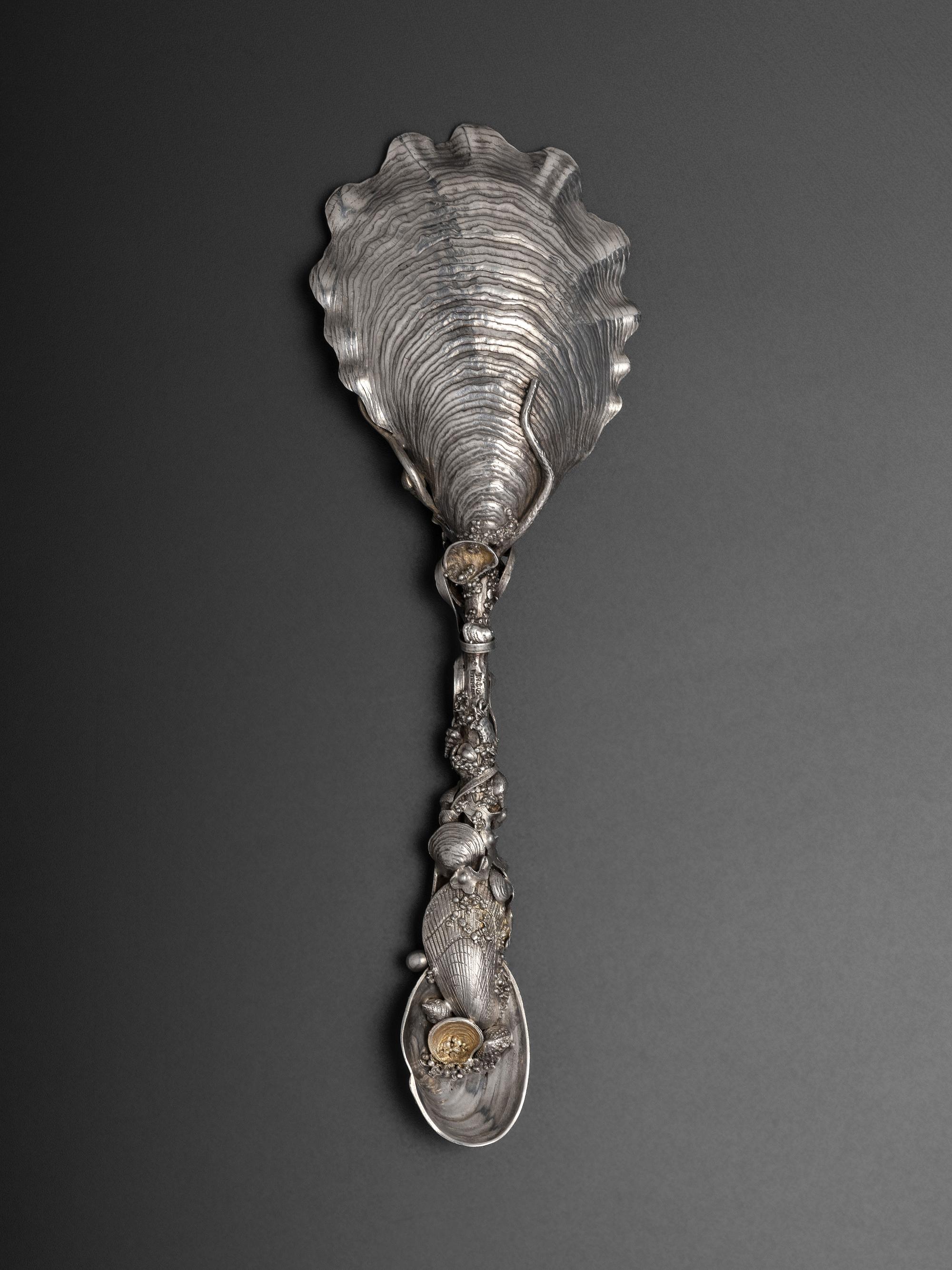 An American Parcel Gilt Silver Serving Spoon