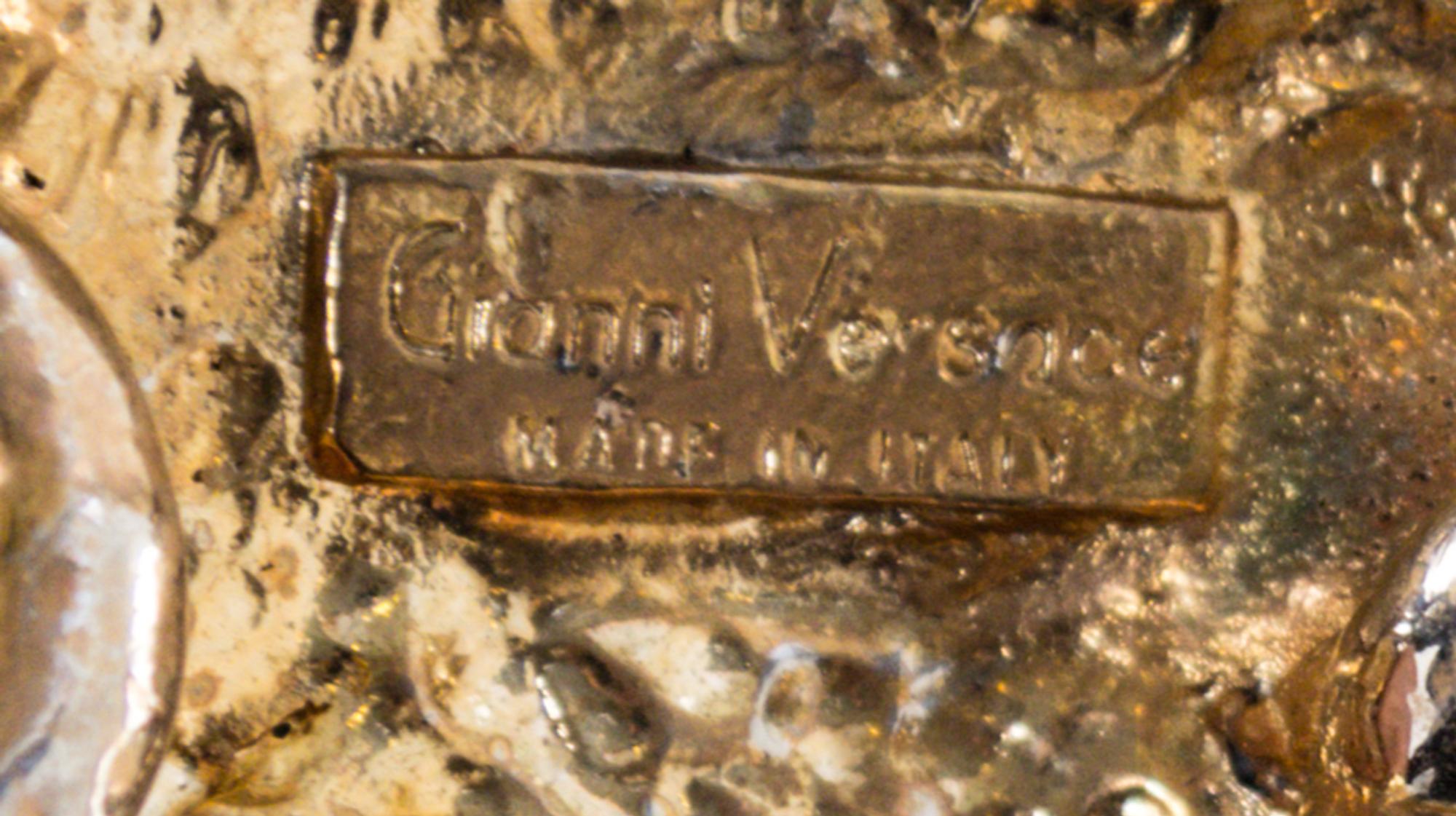 A Gianni Versace Cat Head Link Belt, No Size.