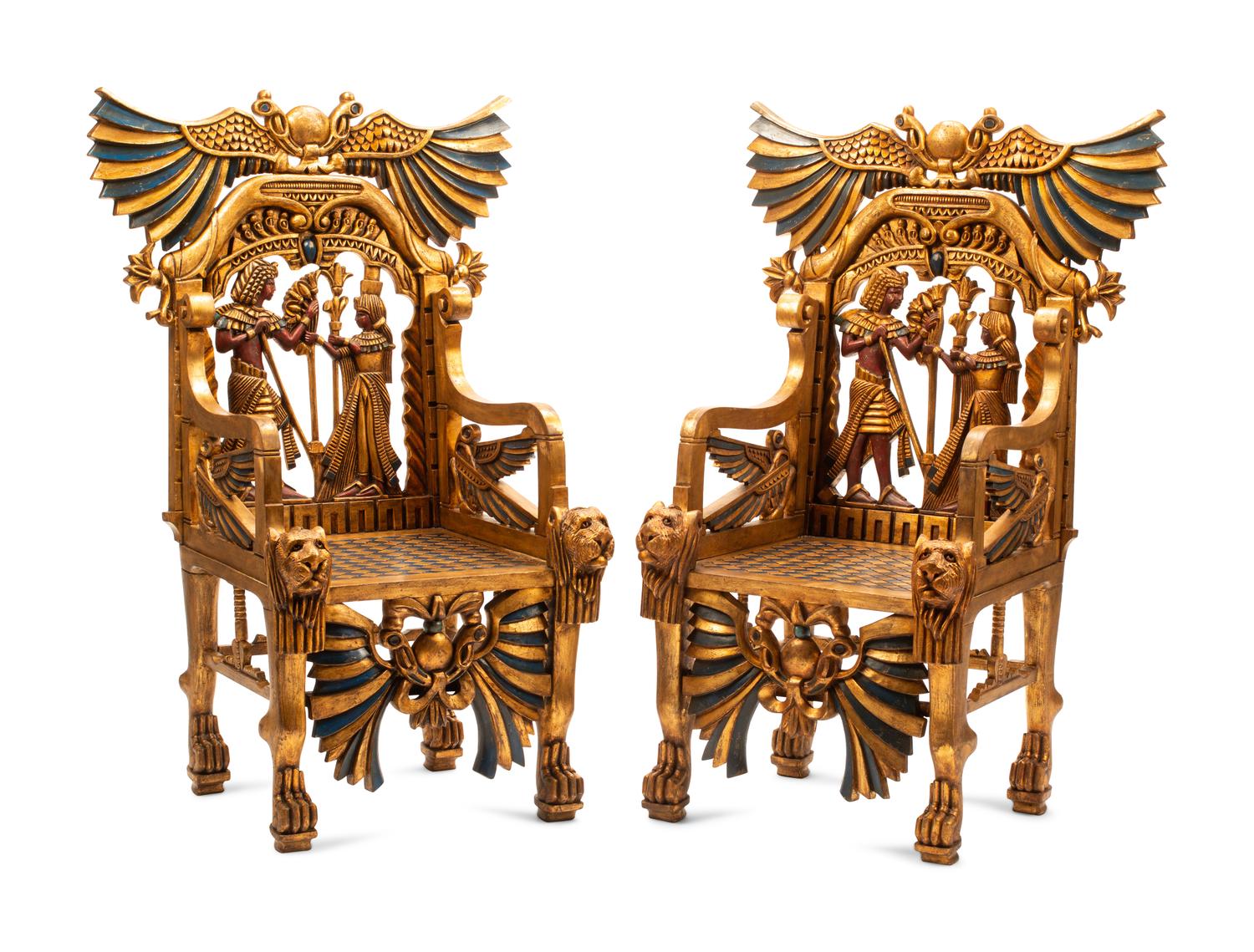 A Pair of Egyptianesque Painted and Giltwood Throne Chairs