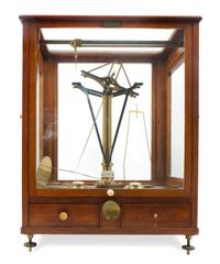 An English Brass and Wood-Cased Assayer's Balance Height of case 23 1/2 x width 17 x depth 12 1/2 inches. — L. OERTLING, LONDON, LATE 19TH/EARLY 20TH CENTURY