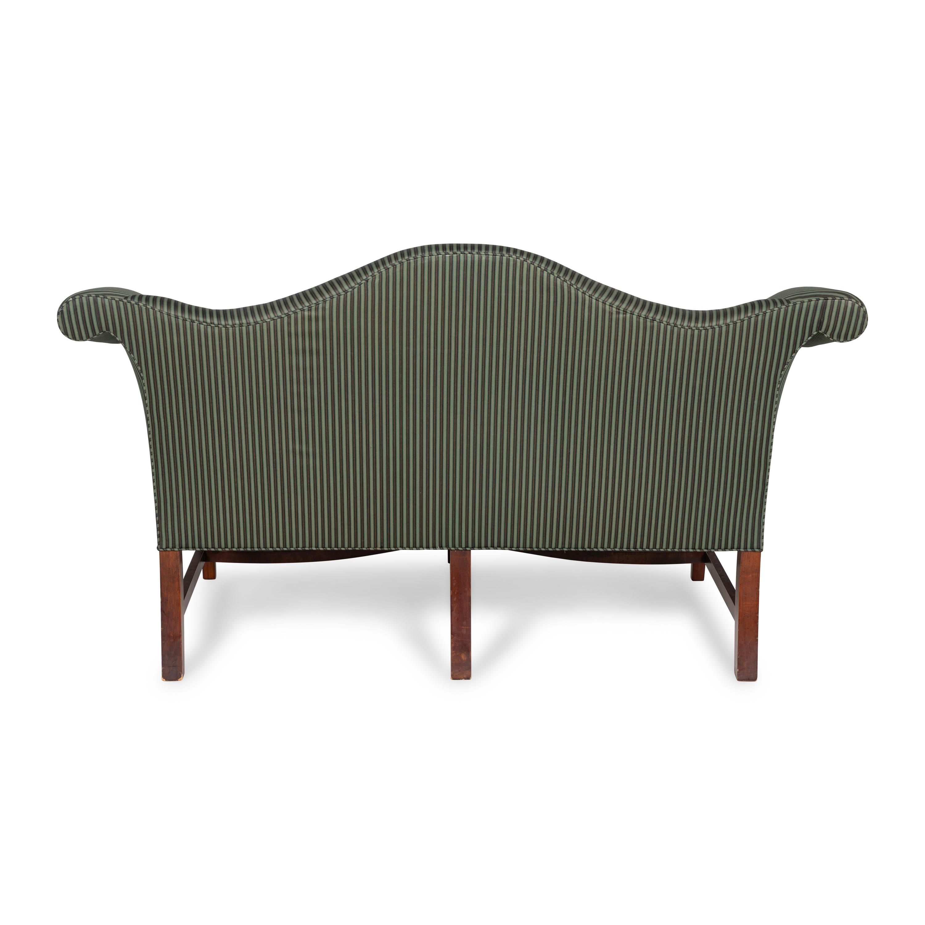 A George III Style Mahogany Camelback Serpentine Sofa
