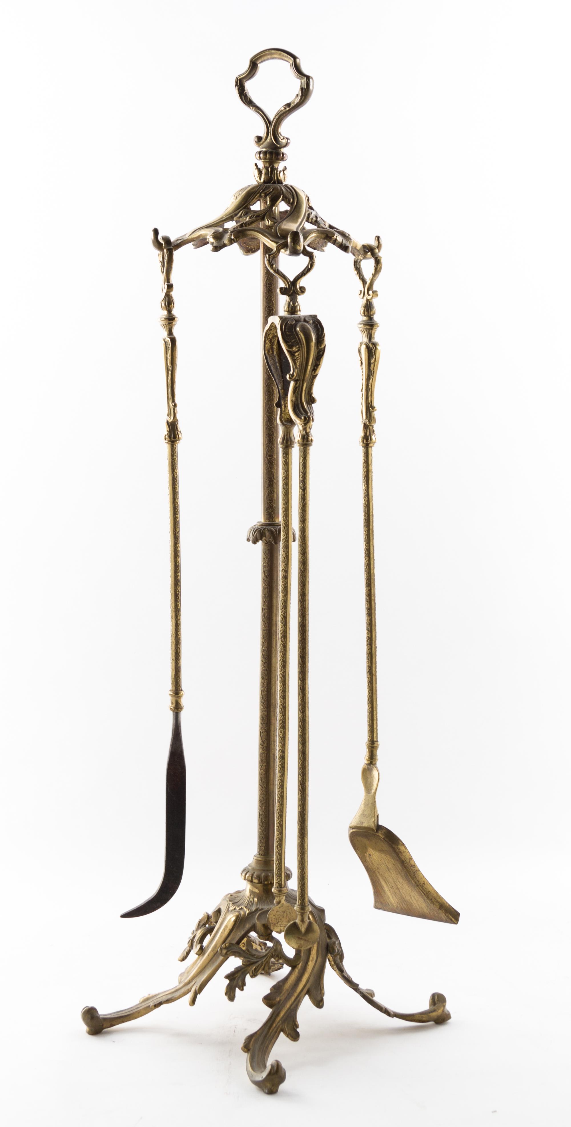 An Assembled Group of Gilt Bronze Fireplace Articles Height of first 11 inches. — 19TH/20TH CENTURY
