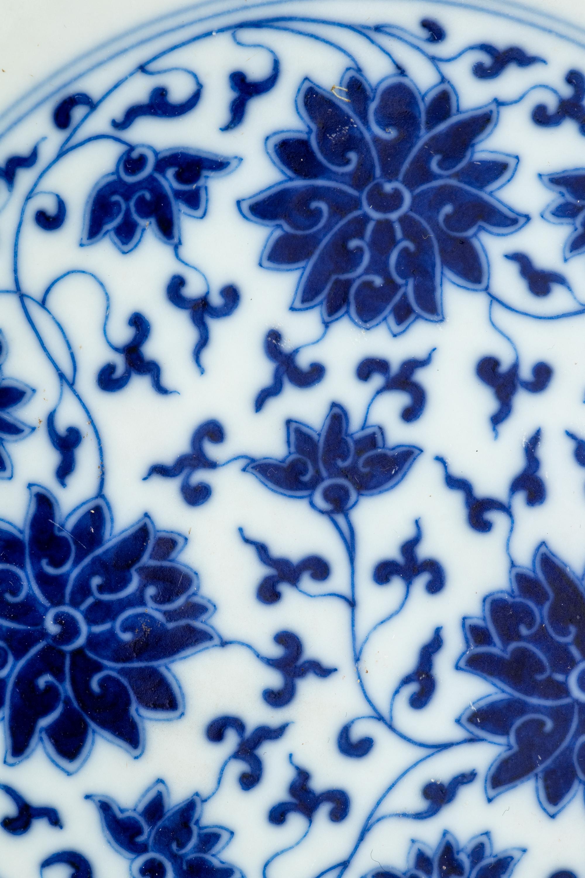 Four Chinese Blue and White Porcelain 'Lotus' Plates