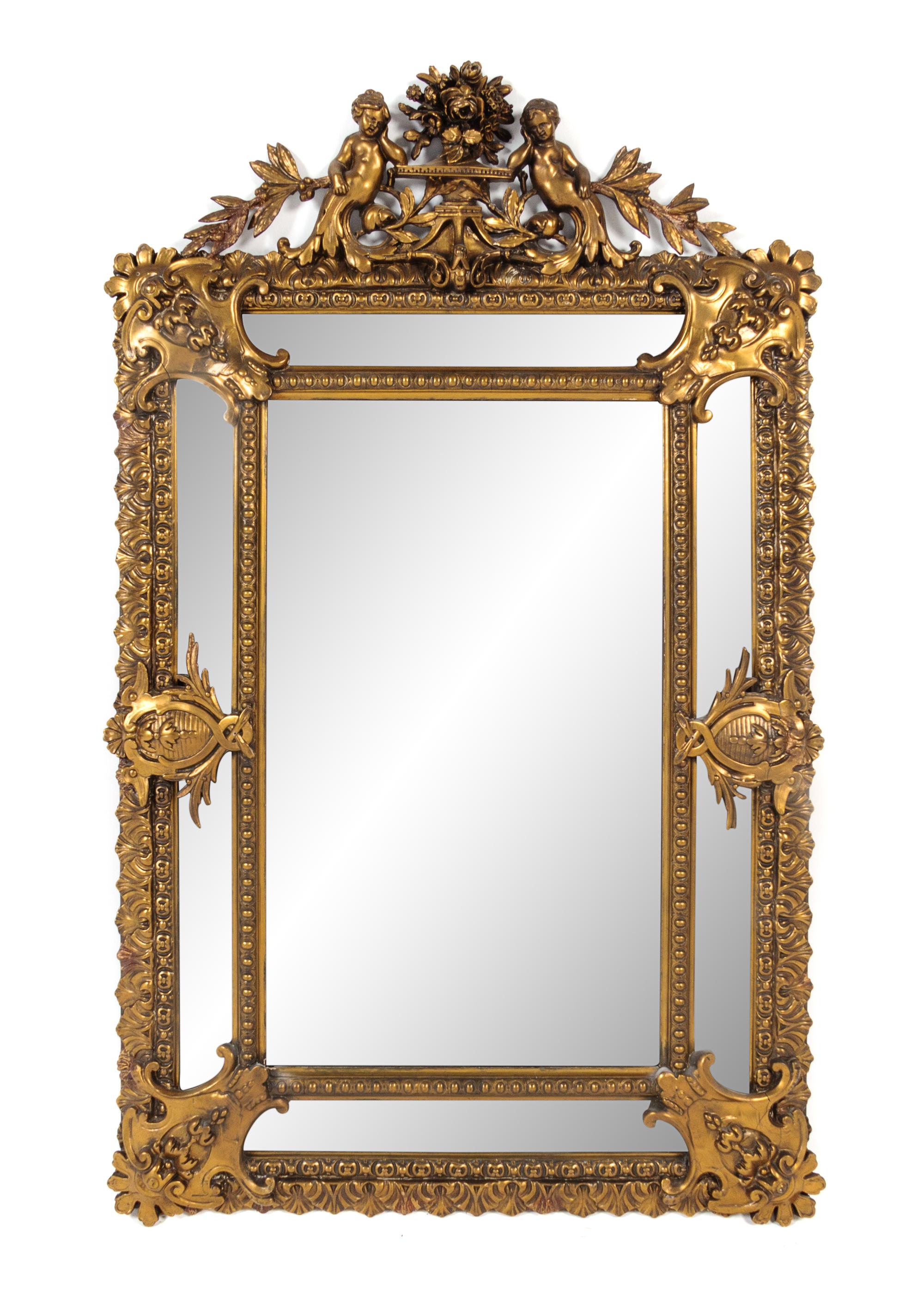 An Italian Baroque Giltwood Mirror