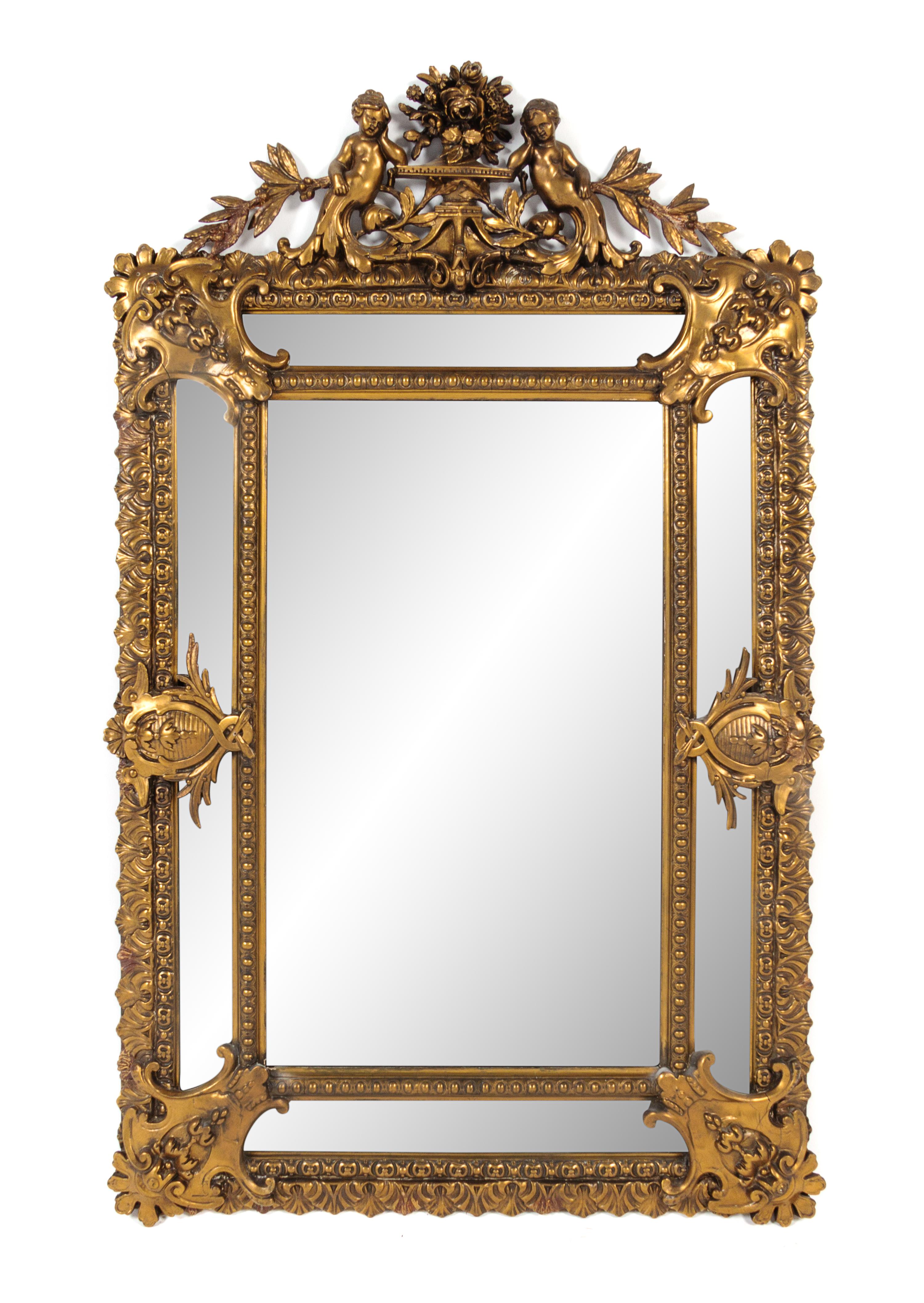 An Italian Baroque Giltwood Mirror