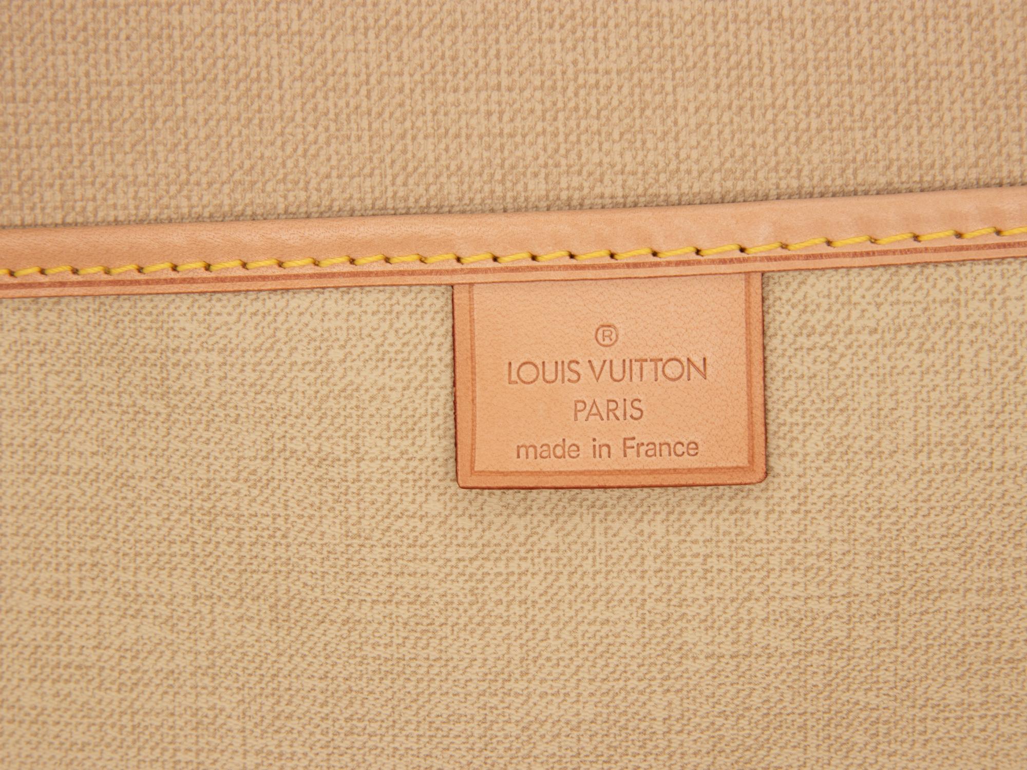 LOUIS VUITTON, MONOGRAM EXCURSION TRAVEL BAG