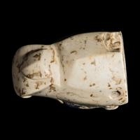 A Mesopotamian Marble and Lapis Lazuli Inlay Bull Head